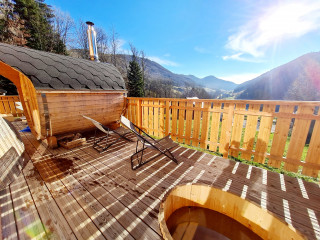 terrasse lodge avec sauna et bain