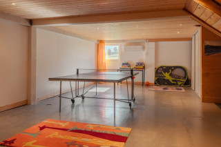 Salle de jeux ou de réunion Gite le Moulin - © Clévacances Salle de jeux ou de réunion Gite le Moulin