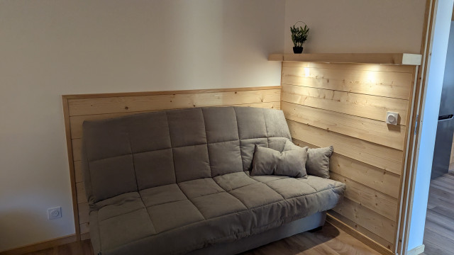 Canapé convertible dans la chambre 1